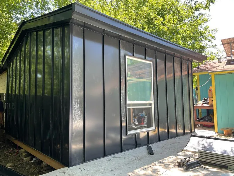 Black standing seam metal wall panels for Metal Roof Installation in Spring Lake